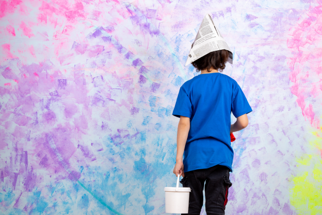 little-boy-back-view-blue-t-shirt-holding-paint-brush-paints-multicolored